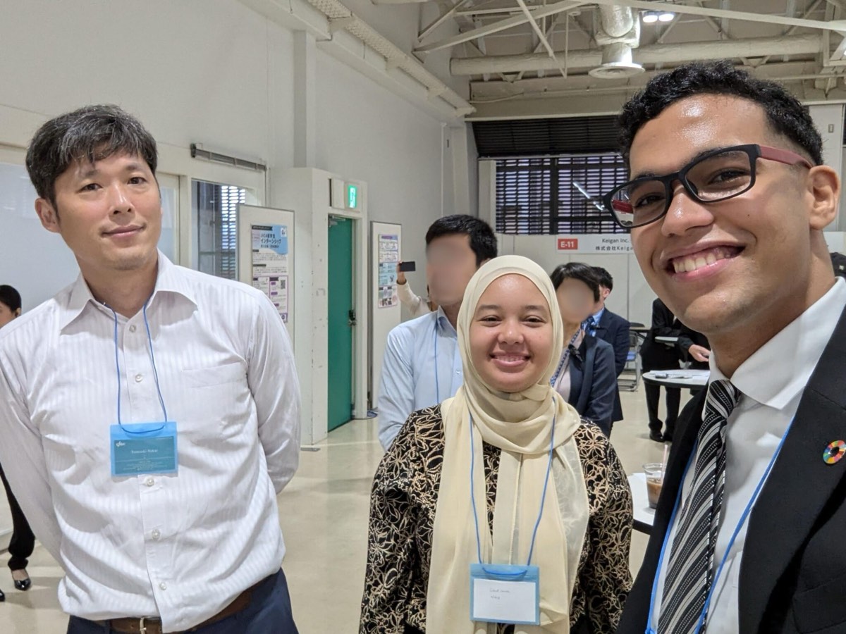 eftax colleagues with international partners at a networking fair